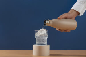 Sustainable hydration using reusable bottle and purified drinking water