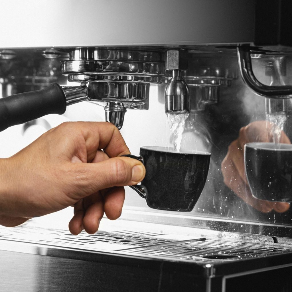 close-up-hand-holding-coffee-cup
